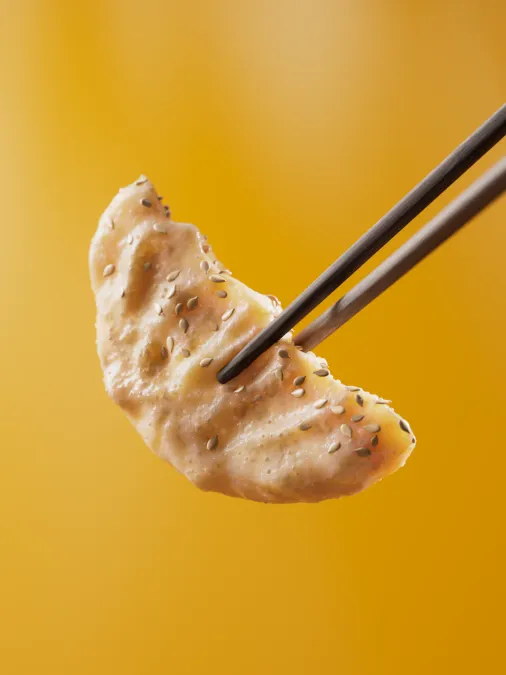 Studio-lit 3D render of gyoza dumplings. Maya modeling, V-Ray render, Photoshop finishing.