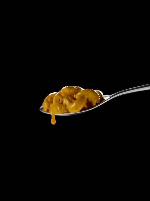 Tactile 3D render of a spoonful of cream. V-Ray lighting, Maya modeling, Photoshop retouch.